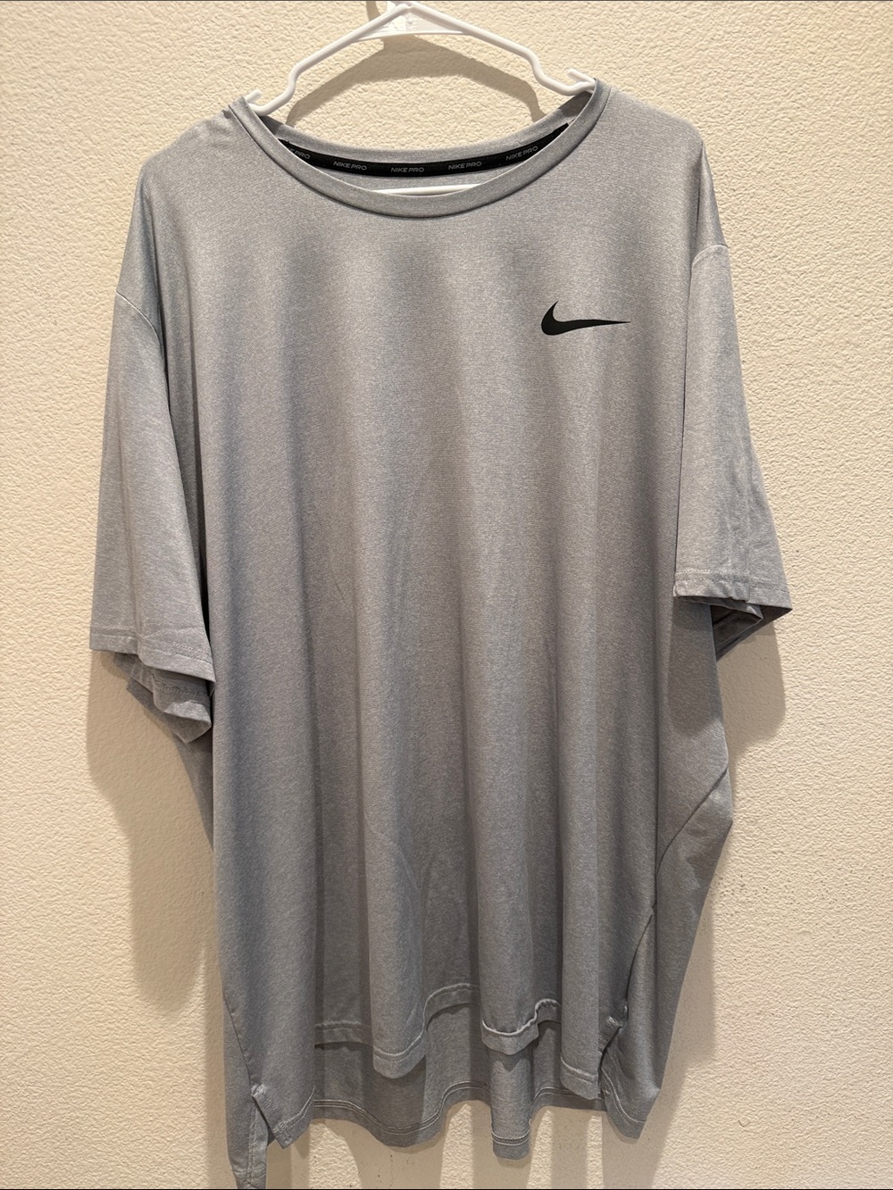 Nike Light Gray Short Sleeve Dri-FIT Training Tee with Black Swoosh